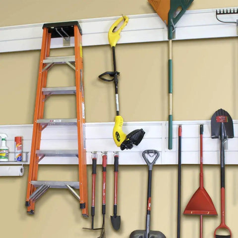 Heavy Duty PVC Slatwall Garage Organizer System 8 Ft By 4 Ft White Panels For A No-Fuss 32 Sq Ft Setup, Interlocking Slatwall Panels, Holds Up To 75 Lb Per Sq Ft, Includes Trims And Hardware For Stud Or Drywall Installation in use with tools hung