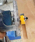 Quarter Inch Shank Rabbet Router Bit With Six Carbide Tips And Interchangeable Bearings in use on wood for cabinetry