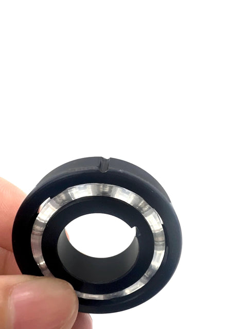 Turbine bearing replacement part for pool vacuum cleaner; black plastic housing with metal bearing