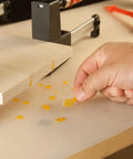 Hand peeling glue off Silicone Glue Mat XXL For Workbench 23.5 By 60 Inches Easy Clean Craft Surface To Protect Tables From Glue Spills