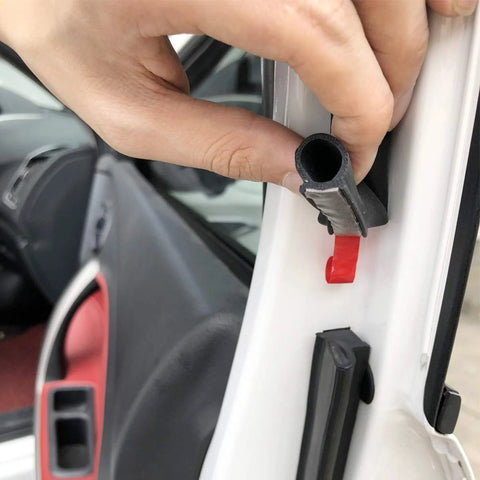 Amazon GoldWheel D-shaped weather stripping for car doors, close-up of black rubber seal with red adhesive, 8 ft
