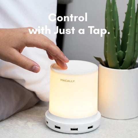 Hand touching Touch Activated Nightstand Lamp with 4 USB Ports for Fast Charging, 3 Way Dimmable and Compact for Small Spaces