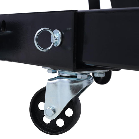 Close-up of the smooth rolling iron caster wheel on the Hella Stable 2 Ton Folding Engine Hoist Cherry Picker, ideal for heavy duty tasks.