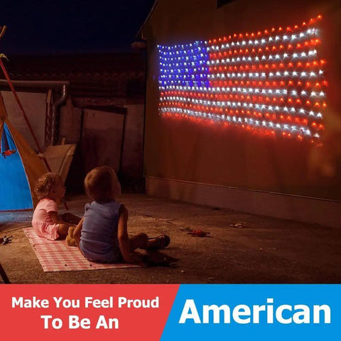 Children watch Patriotic Flag String Lights With Solar Or USB Power, 420 LED Net Light illuminating a wall outdoors at night.