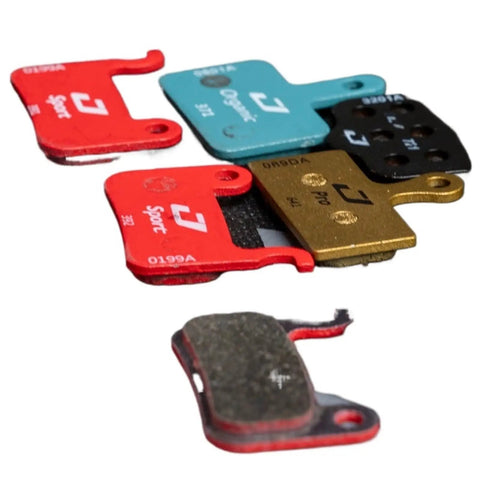 Heavy Duty Disc Brake Pads Crafted For Badass Stopping Power And Tight Control On Mountain Bikes Featuring Whisper Quiet Operation, assorted colors and sizes.