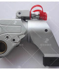 Top Shelf Hydraulic Torque Wrench With 1 1/2 Inch Drive Built For Knocking Out Stuck Bolts Fast And Easy Using Gutsy Aerospace Grade Steel Plus Rock Solid Swivel Controls And Killer Precision, side view of hydraulic mechanism.