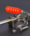 Professional Grade 304 Stainless Steel Toggle Clamp For Woodworking Quick Release Push Pull Hold Down Workbench Fixture Tool With Dead Solid 136 Kg Grip That Locks Real Tight, viewed from the side with a red handle.