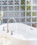 High Arc 2-Handle Widespread Roman Tub Faucet With Valve And Supply Lines Chrome Finish Demeter 1436201 installed on tub