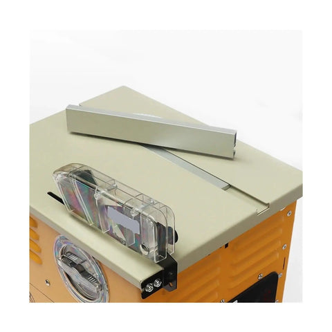 Game Changing Heavy Duty Mini Table Saw With Dust Free Build And Beefy 2300 Watt Motor Spinning At 4900 Rpm top view showing dust cover and alignment guides.