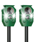 Two Pack Solar Ultrasonic Animal Repellers With Motion Sensor For Outdoor Yards And Gardens, two green stake-mounted units