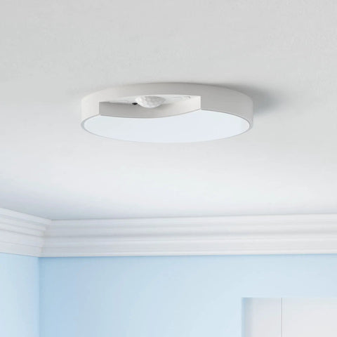 Ceiling view of Rechargeable Motion Sensor Ceiling Light With Remote, 7.5 Inch LED Fixture for indoor spaces, mounted on white ceiling.