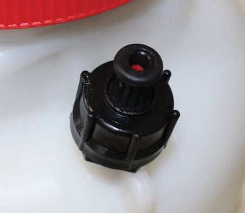 Close-up of the nozzle on a 2 Gallon Handheld Sprayer With Base Large Four And A Half Inch Fill Opening 20 Inch Unbreakable Wand