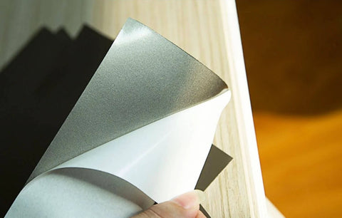 Close-up of Two Pack RFID Ferrite Shielding Sheets 200x300mm For EMI Absorption, showing self-adhesive backing and ferrite material.