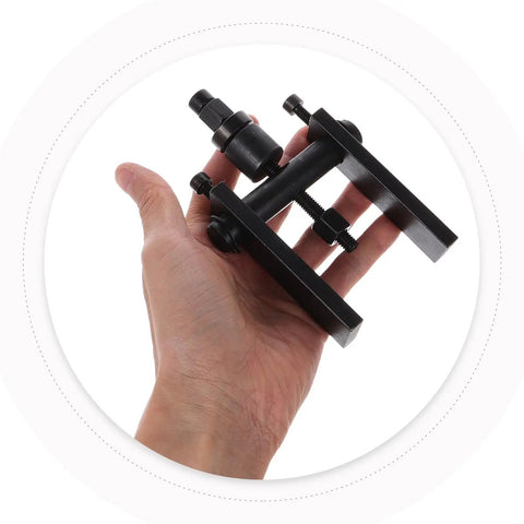 Heavy Duty Motorcycle Wheel Bearing Puller Kit Featuring 2 Jaw Mechanical Extractor Bearing Separator Tool Good For Bike Repair And Garage Fixes Built Like A Beast To Handle Stubborn Wheels Without Breaking A Sweat Or Spending More Than Necessary, black steel 2-jaw extractor in hand