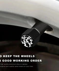 Close-up of Dope Cow Print Tire Valve Stem Cap installed on wheel, showcasing hexagonal shape and cow print pattern.
