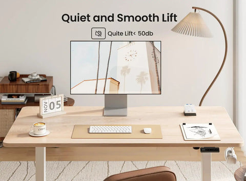 Sit Stand Electric Standing Desk 48 By 24 Inches With Quiet Motor Smooth Height Adjustment From 28 To 46 Inches Ergonomic Computer Desk With Splice Board White Frame And Maple Top Ideal For Home Office showing a monitor and lamp display