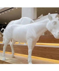 White PLA Filament 1.75mm 1kg for 3D printing sculpture of a horse on display, highlighting material strength and heat resistance.