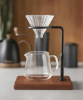 Adjustable Height 360 Rotating Pour Over Coffee Dripper Stand With Sapele Wood Base And Aluminum Arm For Manual Brewing setup with glass carafe.