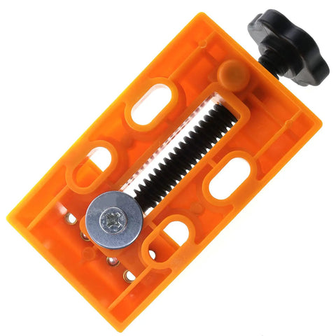 Legit Tight Grip Mini Table Vise With Quick Release ABS Plastic Jaws in orange, showing clamping mechanism for tiny parts.