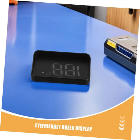 Vehicle Speedometer Display With Green LCD For Cars on blue table, USB powered HUD.
