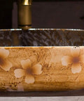 Slick Above Counter Bathroom Vessel Sink 16 Inch Rectangular Porcelain Basin with floral design and baked glaze on countertop.