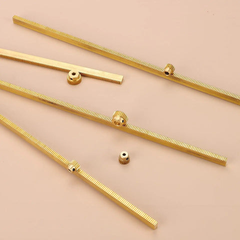 Beefy Brass Spur Gear And Gear Rack Set 0.5 Module 30 Tooth Pinion With 4mm Bore 10x5x300mm Rack on light background