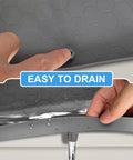Under Sink Mat 34 Inch By 22 Inch By 0.67 Inch Silicone Cabinet Protector showing easy drainage in dark gray.