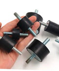 Top Tier Rubber Isolator Mounts For High Elasticity Vibration Dampening Pads shown in hand with steel threading for easy install.