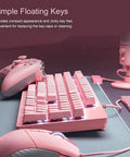 Beast Mode Wired Opto Mechanical Gaming Keyboard Featuring Killer Rgb Led Backlighting And Snappy 45 Gram Actuation Switches Engineered For Absolute Zero Lag Pc Gaming Marathons in pink, showcasing floating key design.