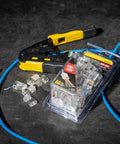 RJ45 Cable Tester Kit With LAN Scout Jr 2, coax crimper, and 50-pack modular data plugs with backlit LCD for CAT5e, CAT6, CAT6A cables.