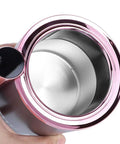 Premium Dual Action Car Beverage Warmer And Chiller Cup with sharp digital temp gauge, aluminum build, hand-held view.