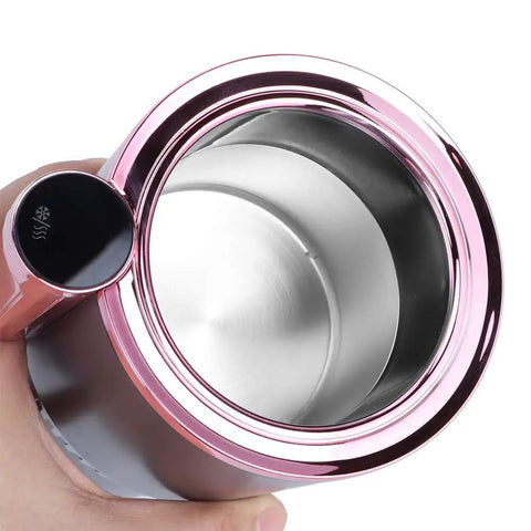 Premium Dual Action Car Beverage Warmer And Chiller Cup with sharp digital temp gauge, aluminum build, hand-held view.