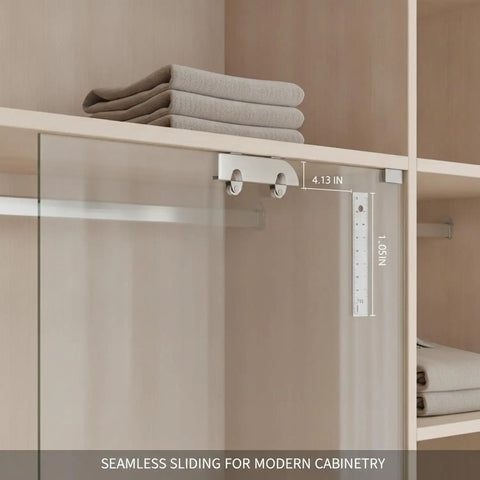 Heavy Duty Sliding Door Track System For Frameless Cabinets Built With Cold Rolled Steel Rails And Premium Stainless Steel Casters For Kitchen Renovations. Close-up view of installed track with glass door.