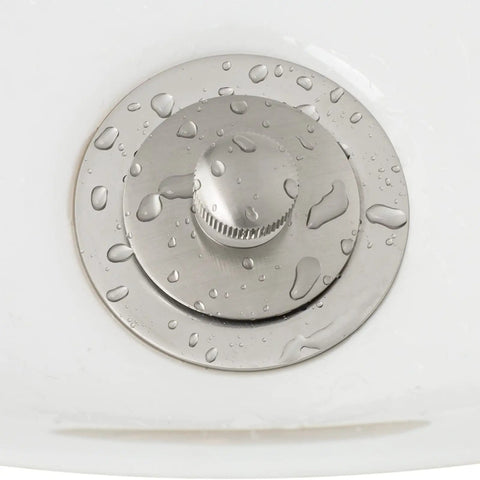Push And Lock Bathtub Drain Stopper Kit With Trim Set And Single Hole Overflow Faceplate, brushed nickel finish in use.