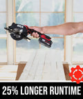 Super Compact One Handed Cordless Circular Saw Kit With Four And A Half Inch Blade Brushless Motor 20V Lithium Battery And Charger held in hand.