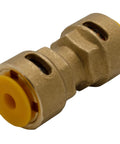 Close-up of brass 3/8-inch HVAC quick-connect coupling with yellow plastic release cap.