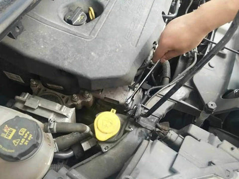 Mechanic using Beefy 10mm Metric Flex Head Gear Wrench With Box End And 72 Tooth Ratcheting on car engine for repairs
