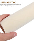 Close-up of a hand holding a 4mm nap wool roller cover, a part of 6 Piece Wool Paint Roller Covers With 4mm Nap, Compact Wall Painting Supplies.