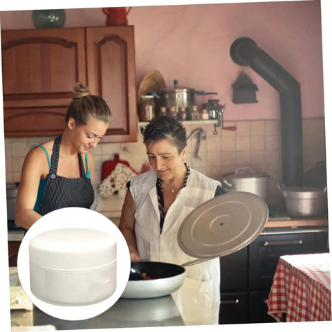 A white jar of Epoxy Tile Repair Kit 100g Two Component Quick Dry Ceramic Adhesive For Loose Porcelain Tiles Bathroom Walls And Floors Crack Repair Waterproof High Gloss Finish shown in a kitchen setting with two people cooking.