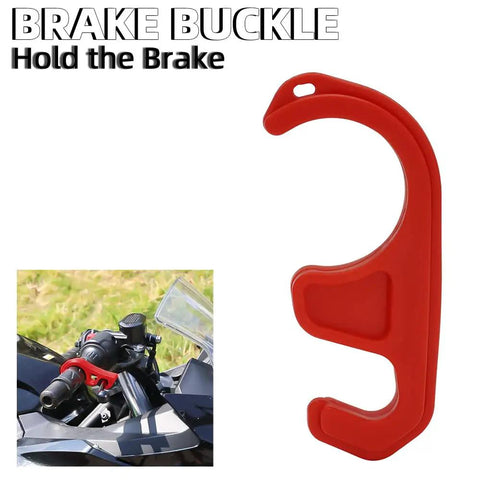 Brake Buckle in red holding motorcycle brake lever, shown on handlebars with clear visor, grass background