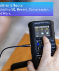 Multi Track Recorder For Musicians with hand adjusting settings, visible screen and controls, focus on built-in effects.
