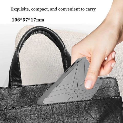 Dual M.2 NVMe SSD Enclosure With Hella Fast 20 Gbps USB 3.2 Gen 2X2 Interface being placed in a handbag.