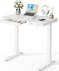 Heavy Duty Glass Electric Standing Desk With Effortless Height Control For Compact Home Office Setup 35 X 20 Inch with drawer and USB ports.