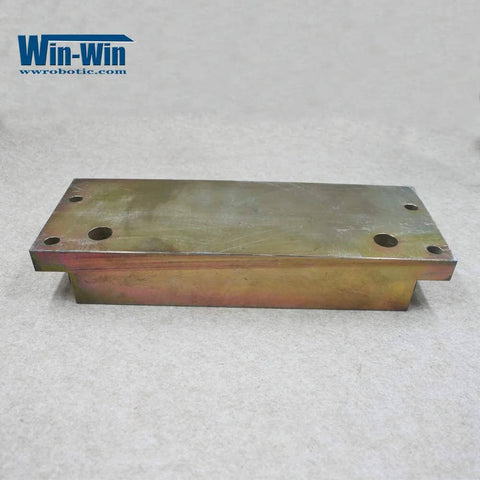 Front view of Win-Win hydraulic manifold top-mount block for waterjet, metal with rainbow finish and multiple through-holes.