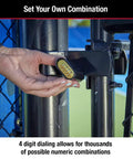 Black Customizable Combination Padlock With Resettable Code For Gates And Lockers attached to a gate, showing four-digit dial.