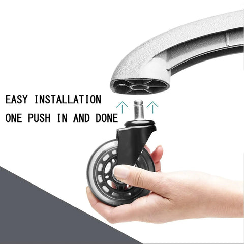 Hand inserting Top Notch Office Chair Caster Wheels Replacement Rubber Casters Drop Straight In for easy installation.
