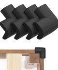 Built Tough Yet Soft Black Foam Corner Protectors Four Pack Pre Taped Rubber Edge Guards For Beds Tables And Desks displayed on furniture edge