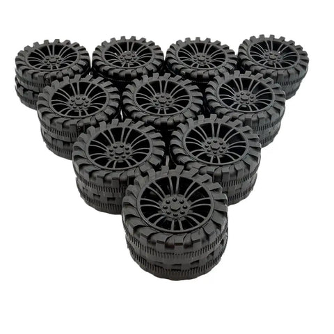 Dope Plastic Toy Car Wheel Set With 2mm Dia Shafts 40 Pack 30mm Wheels stacked in a triangular formation.