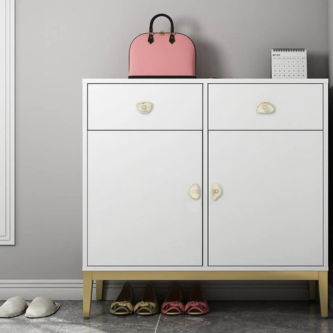Pack Of 4 Slick Polished Agate Slice Cabinet Knobs With Solid Brass Backing And Included Screws on white cabinet in modern setting.