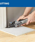 Top Notch 5 Amp Corded Oscillating Multi Tool Featuring Variable Speed And Low Vibration, cutting laminate flooring in a home.